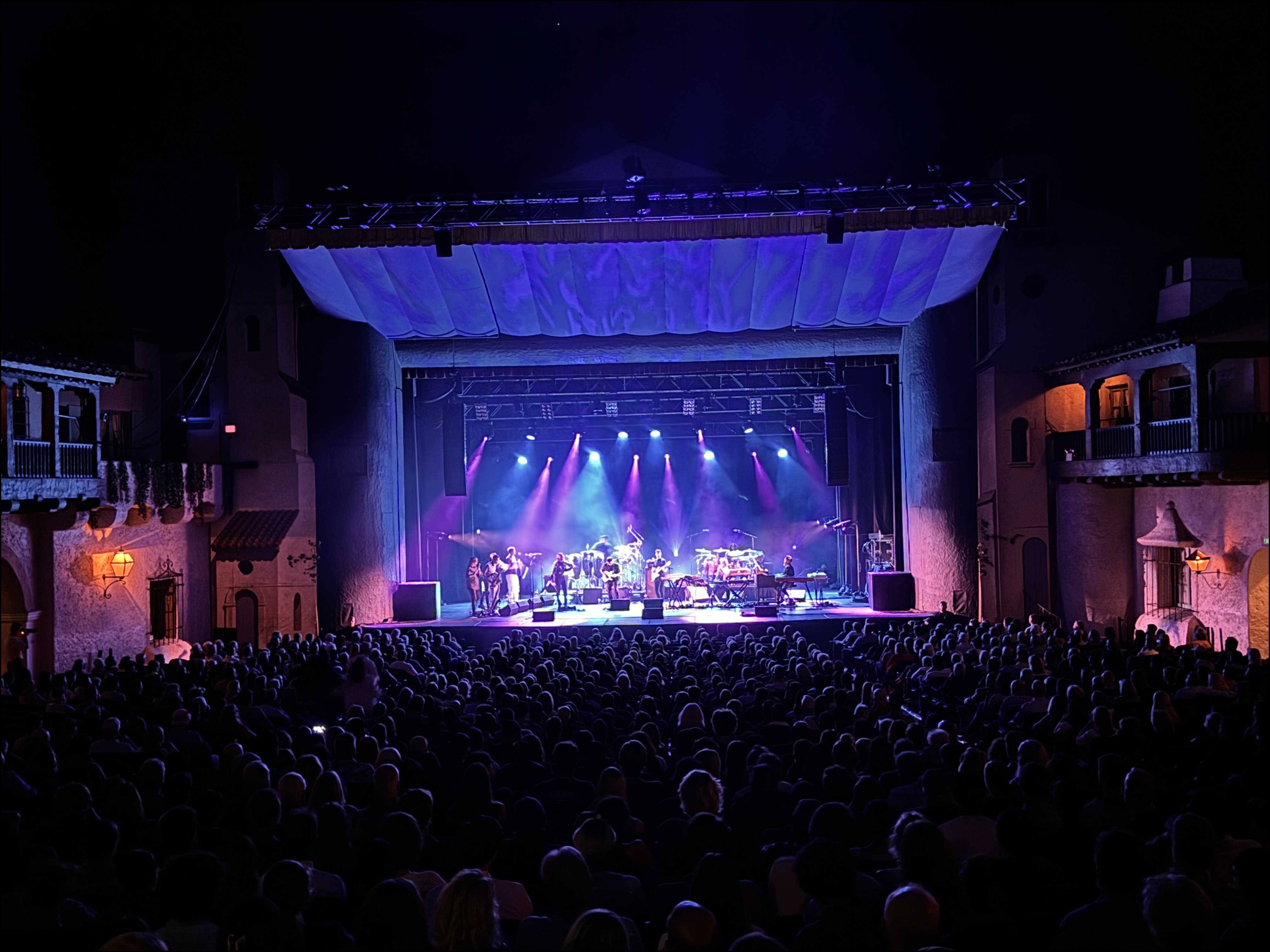 Arlington Theatre concert with dramatic blue lighting